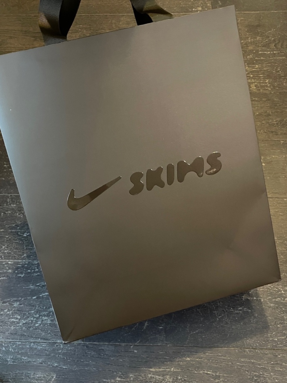Skims Nike collaboration empty brown shopping bag tote storage decoration